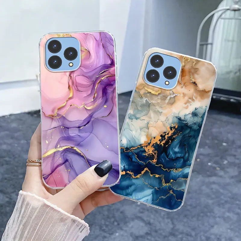 Two marble-patterned phone cases, one pink and purple, the other blue and brown.