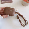 caramel color soft silicone earphone case with bracelet fall prevention couple for airpods 2 3 pro 2 bluetooth charging box case Caseverse