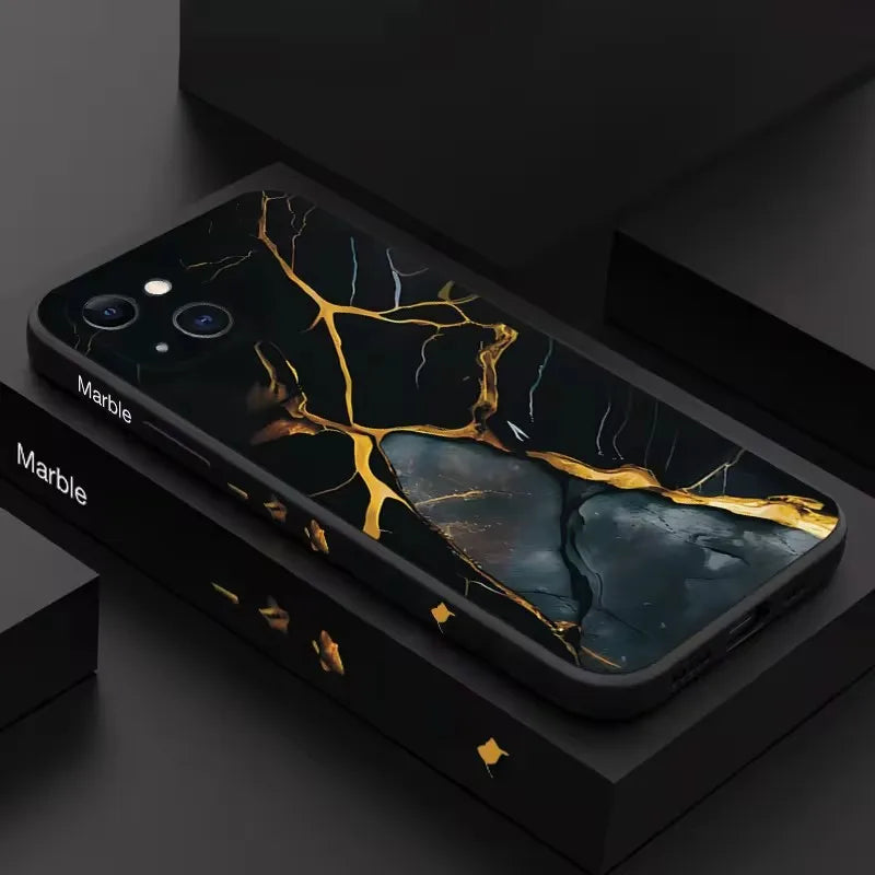 Black marble phone case with gold and white veins.