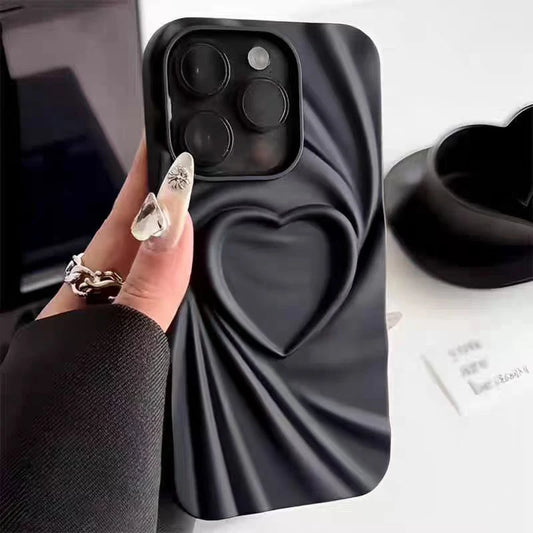 Black silicone phone case with a 3D heart and wrinkle design.