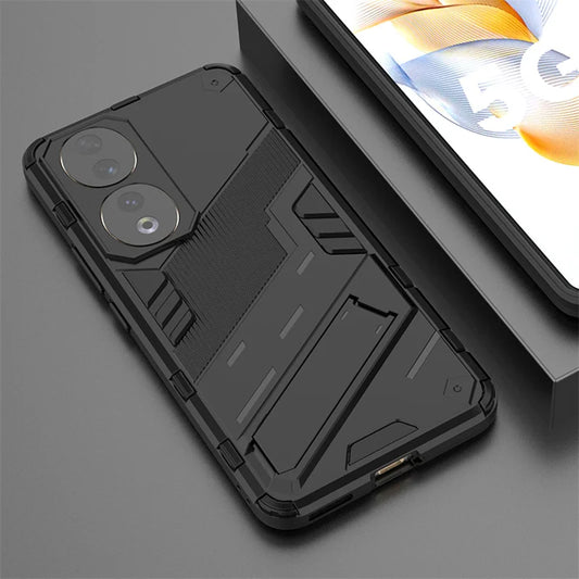 A black rugged phone case with a kickstand and camera cutouts, next to a phone screen.