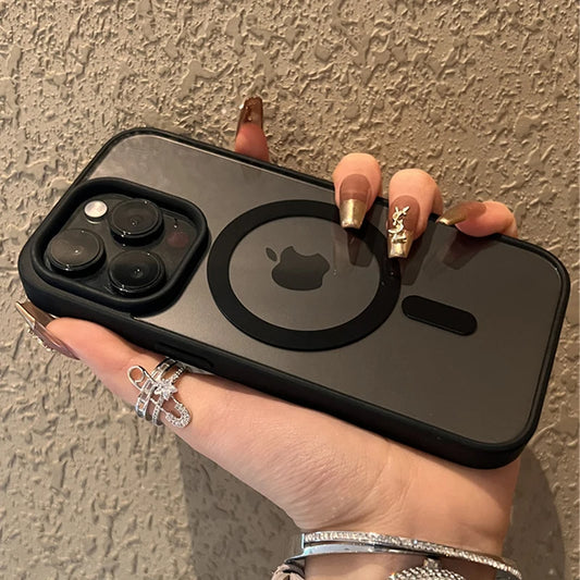 A hand holds a transparent phone case with a black MagSafe ring and camera cutout.