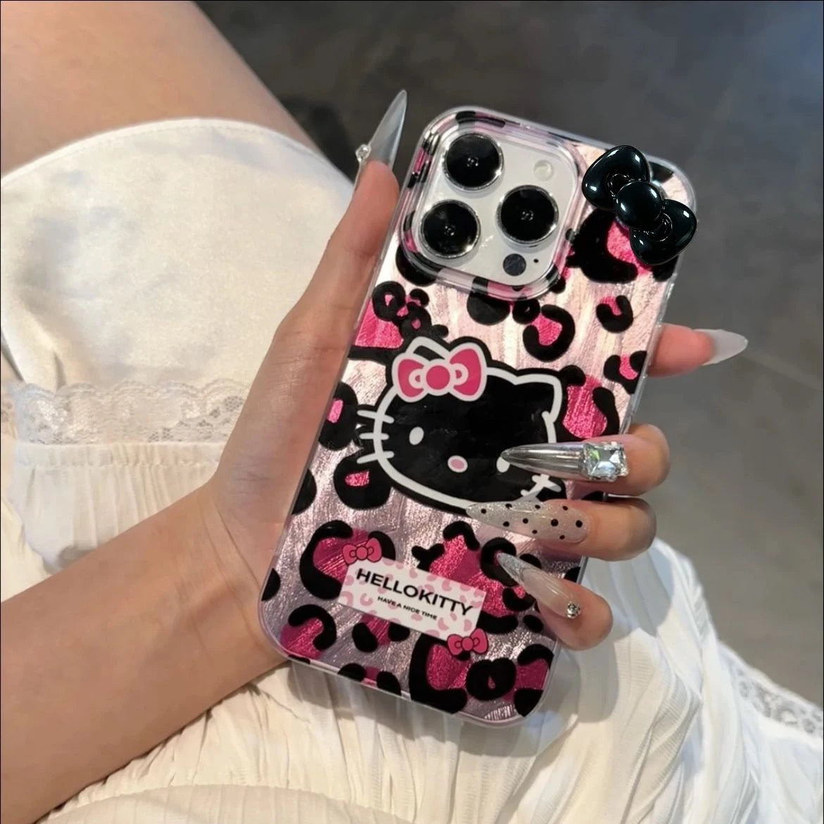 Pink Leopard Print HelloKitty Bow Mobile Phone Case For iPhone 15 14 13 12 11 Pro Max XR XS 7 8 Plus Silicone Laser Covers Y2K - Caseverse